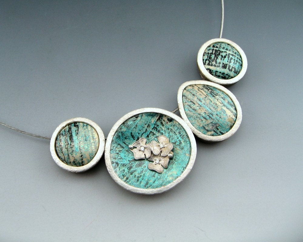 Sterling silver framed polymer clay in abstract blue with flower accent choker necklace