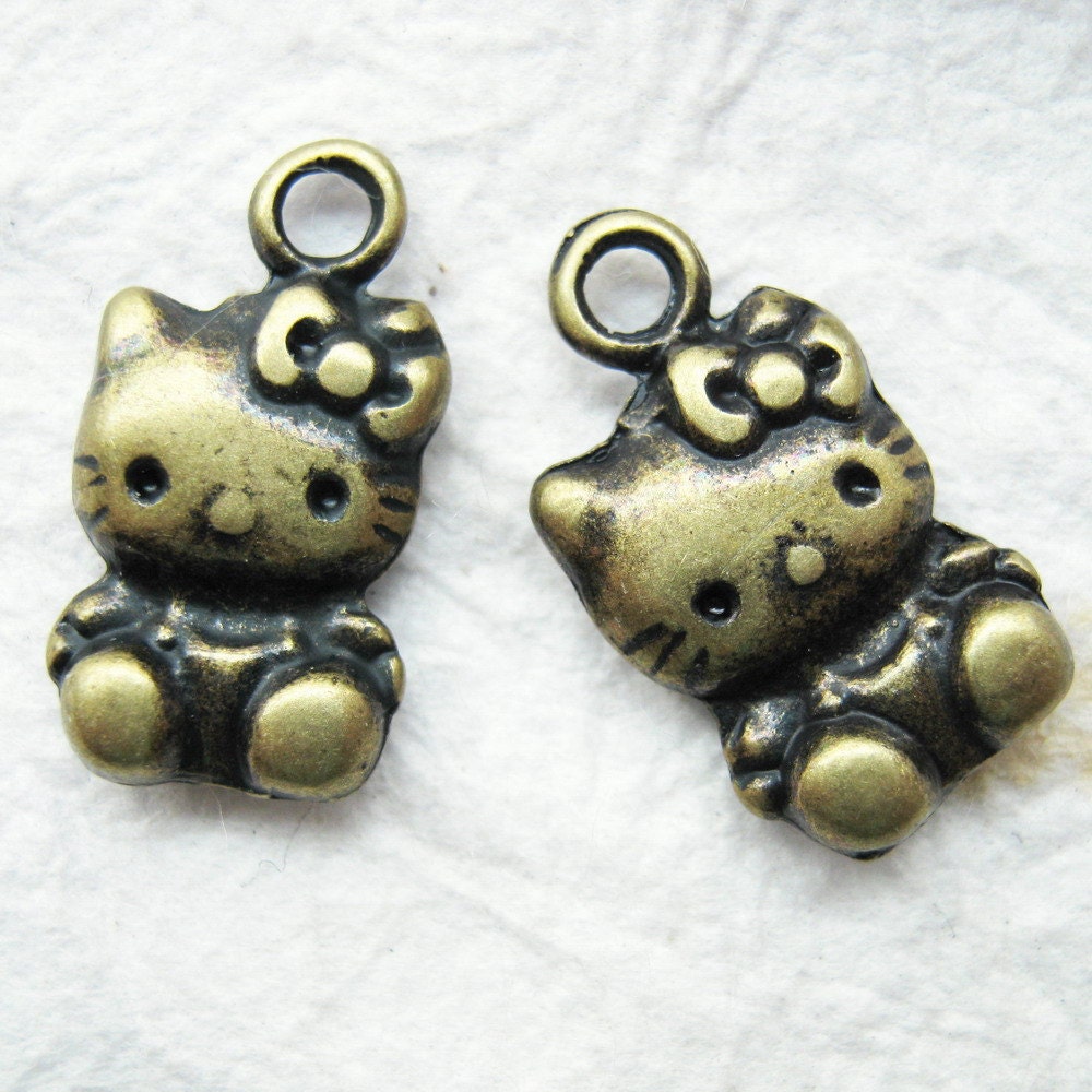 10 pcs of  tiny charms - Hello Kitty antique brass charms