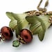 Floral Green Lilies, Chocolate Brown Pearls, Swarovski Crystals, Brass Ornate Drop Earrings