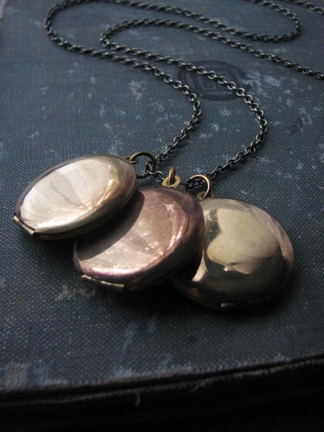 en trois . triplicate vintage locket necklace .