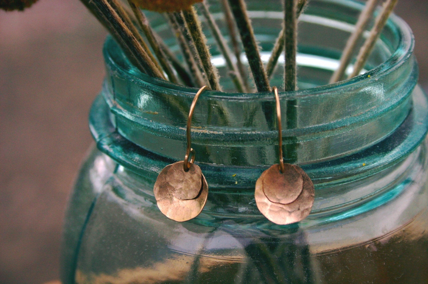 double gold disc earrings.