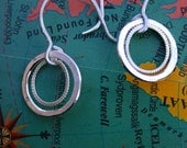 double braided open circle earrings.