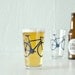 4 bike pint glasses, blue bicycle