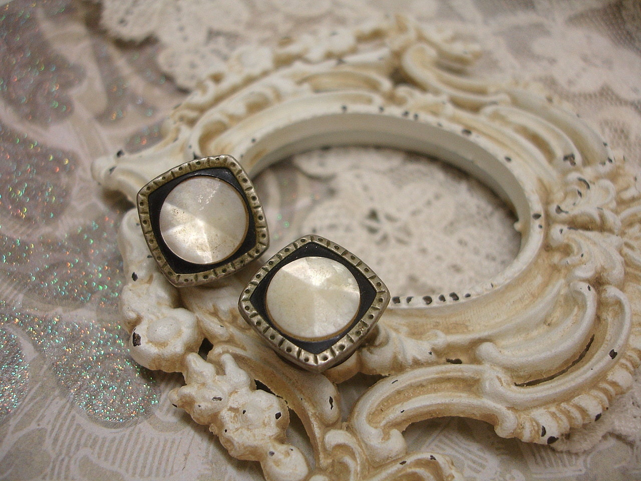one pair anTiQue mother of pearl and enamel snap links . pair antique shirt studs