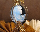 50 percent off until Jaunuary 8th. Use the code Birthday. Black and White Molded Resin Cameo set in 14K Rolled Gold Bangle Bracelet