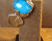 Black Friday Etsy 25 percent off Cyber Monday Etsy 25 percent off Turquoise Blue Cabochon set in 14K Rolled Yellow Gold Bangle Bracelet