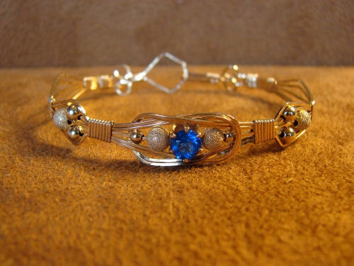 14k Yellow Rolled Gold 1ct. Blue Topaz Bangle Bracelet