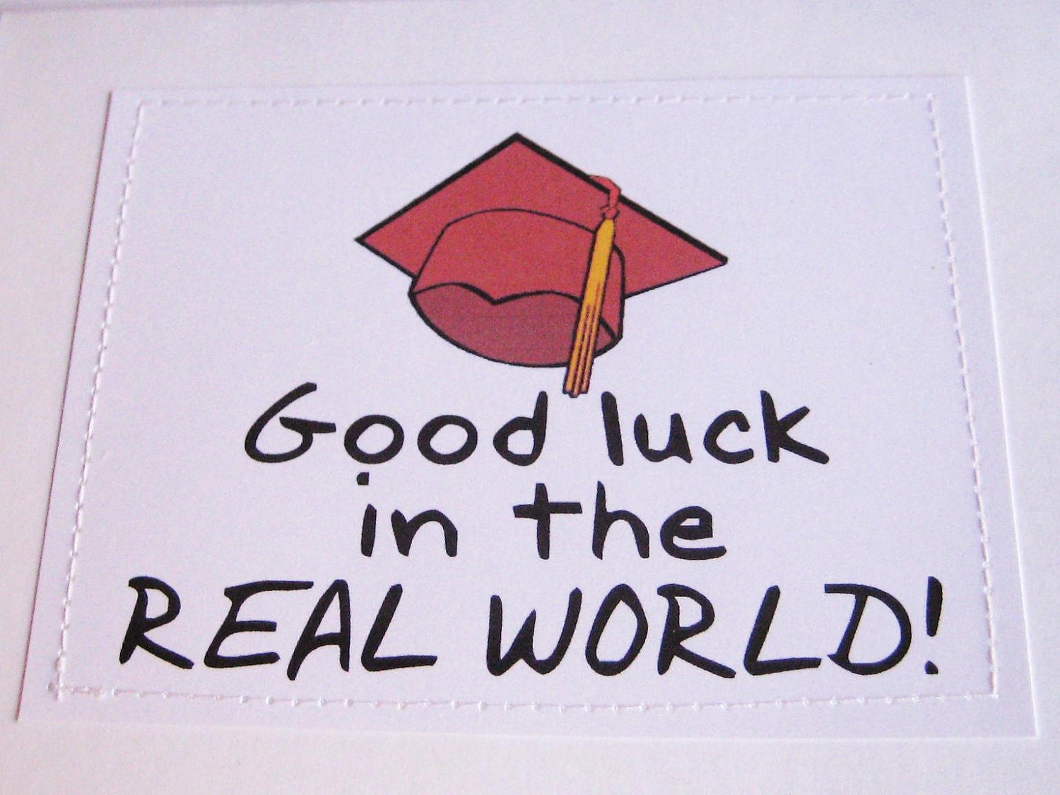 Funny graduation card. Good luck in the real world.