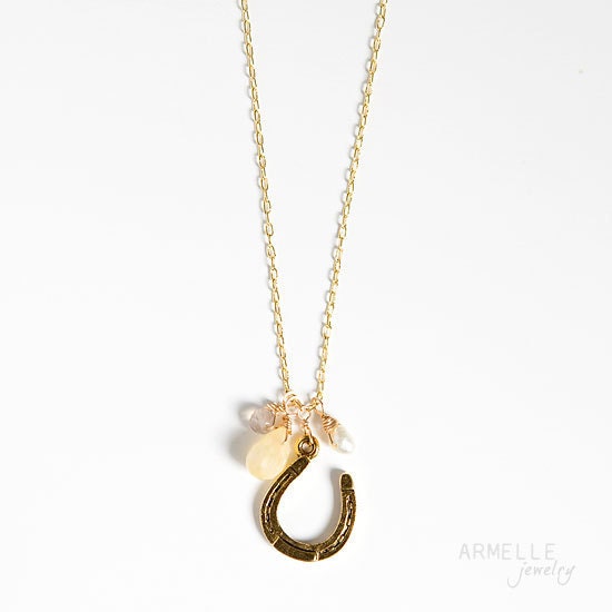 horseshoe charm necklace   . yellow .    gray .