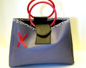 Oh no, its my Ex.  Vinyl purse.  