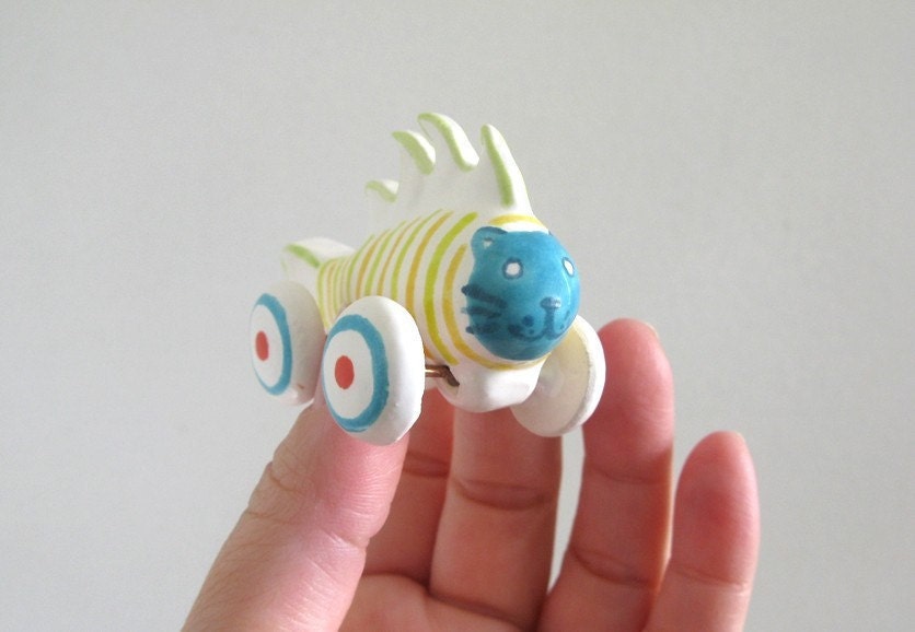 Rolling Blue Cat Fish - miniature ceramic sculpture on wheels