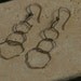 Delicate Expanding Ripple Silver Talisman Earrings