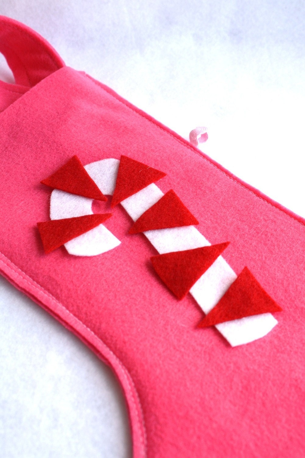 retro candy cane eco friendly felt stocking in pink, white and red