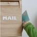 vintage-inspired wooden toy mailbox perfect for valentine's day