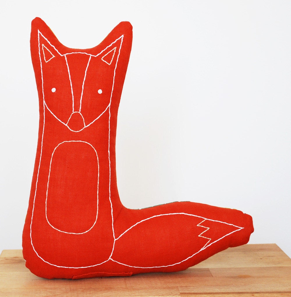 hand embroidered fox pillow in burnt orange
