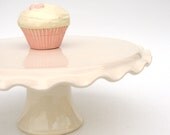 Medium ruffle cake stand in white.