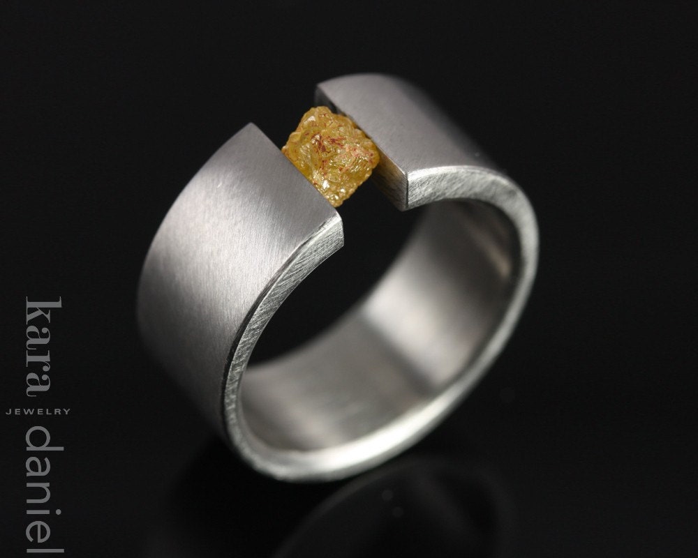 raw diamond tension set in stainless steel. ring