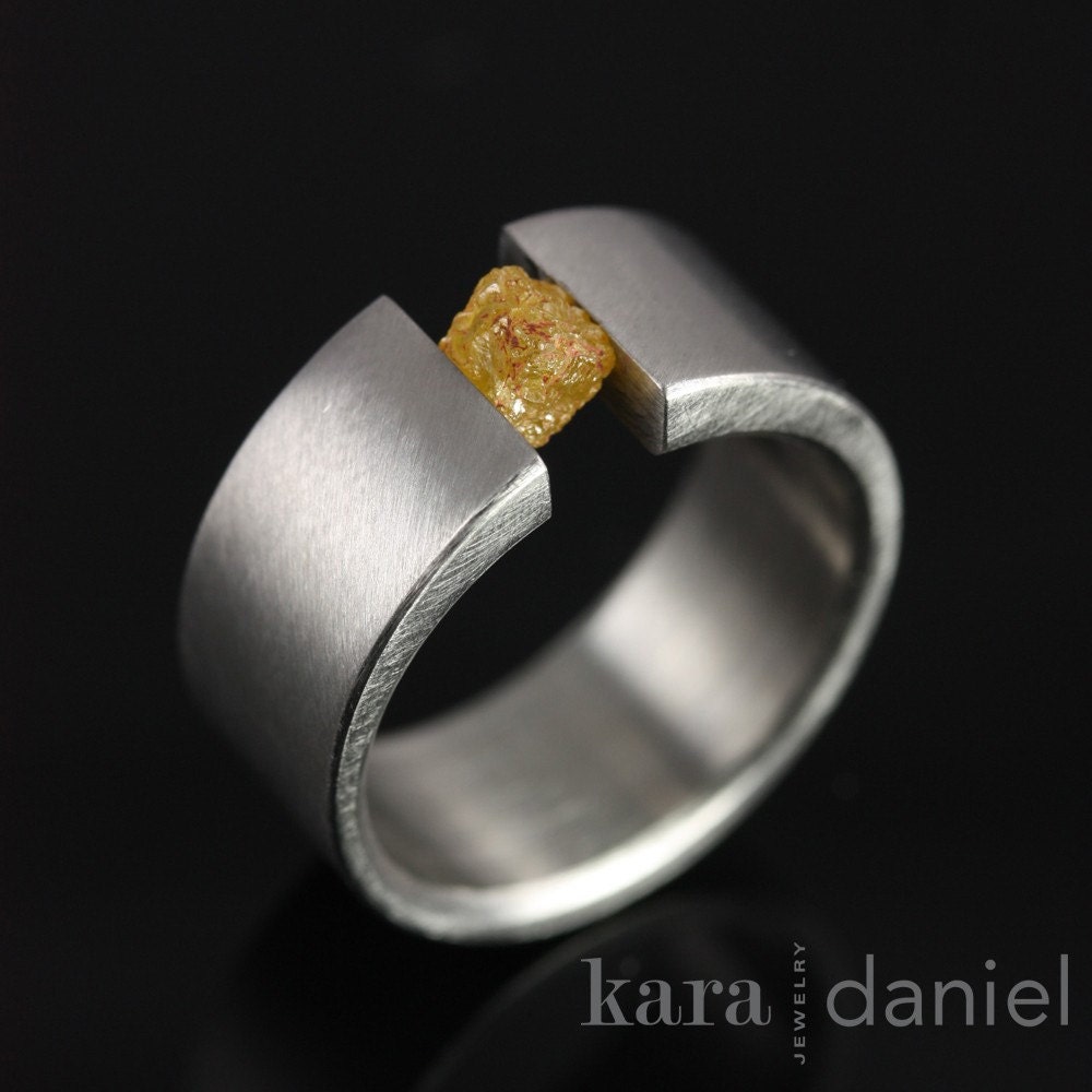 raw diamond tension set in stainless steel. ring