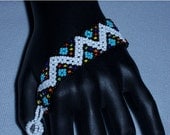 Lattice beaded bracelet- black, white and rainbow