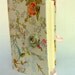Handmade journal / notebook made with floral colorful & silver fabric opens with crystal embedded green enamel button and pink satin ribbon