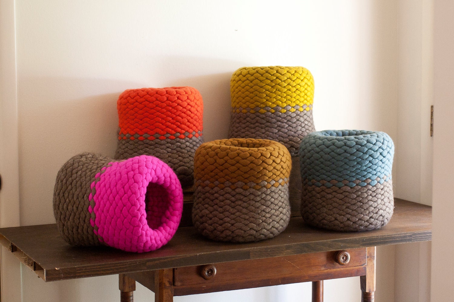 Wool felt knit pod vessel in hot pink and natural gray brown