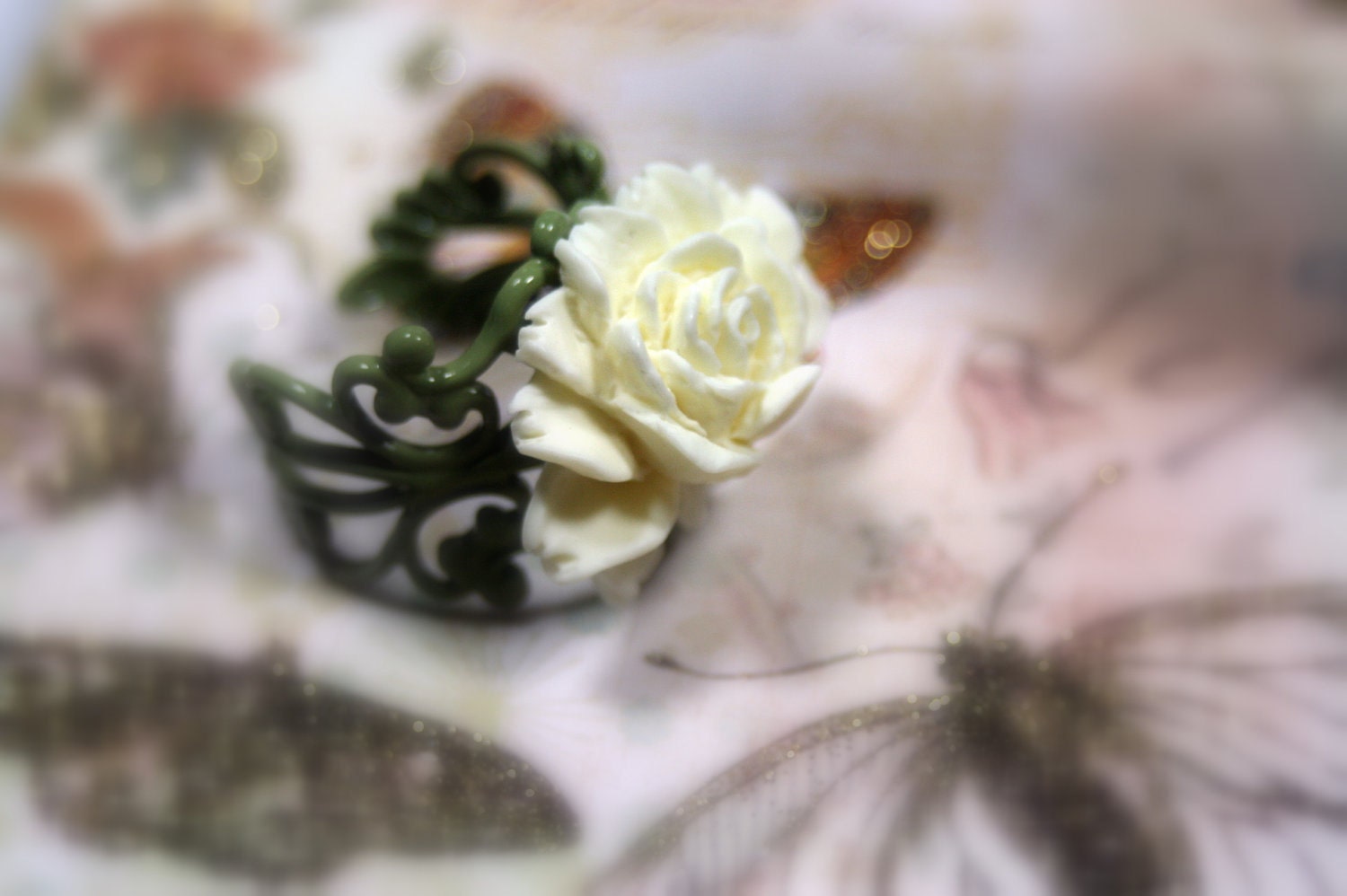 Reflections Ivory Lotus on a pesto Scroll Adjustable Ring Shipping Plucked out