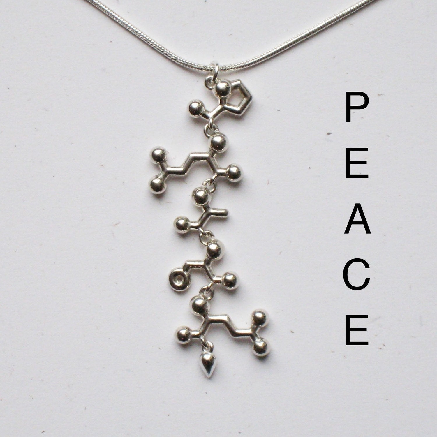 PEACE necklace - spelled in amino acids, the code of life