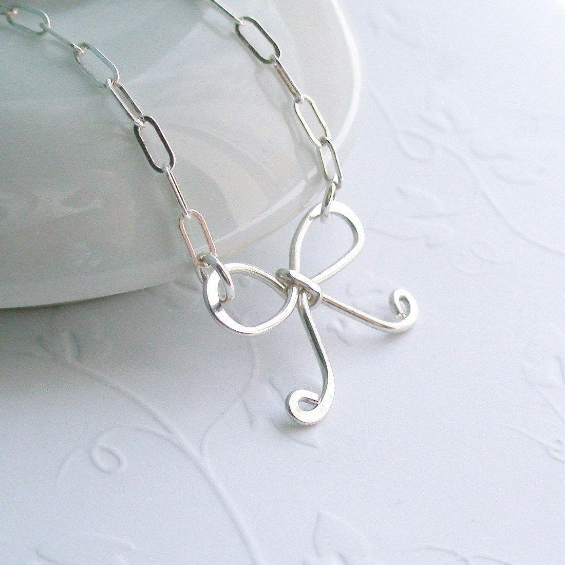 tiny silver bow necklace