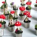 Fairy cottage and toadstool on a mossy thimble lawn - A Faerie Garden