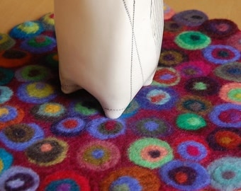 small round table runner with lots of dots
