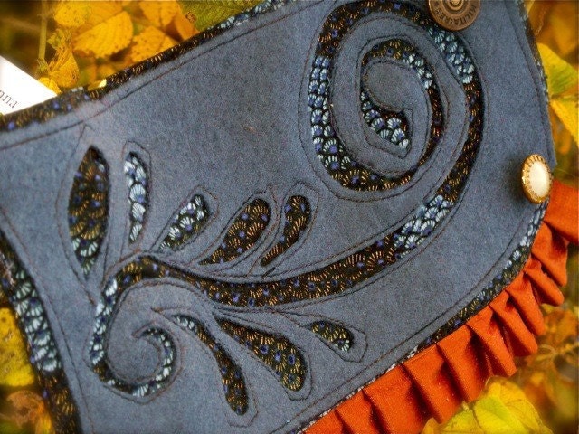 Dutch Swirl wrist cuff in Grey, navy blue, and copper
