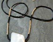 Outline Necklace with Milky Quartz, and Black, Silver and Golden Seed Beads