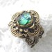 RESERVED - Celtic Rainforest Ring - Emerald Green Glass Opal and Antiqued Brass