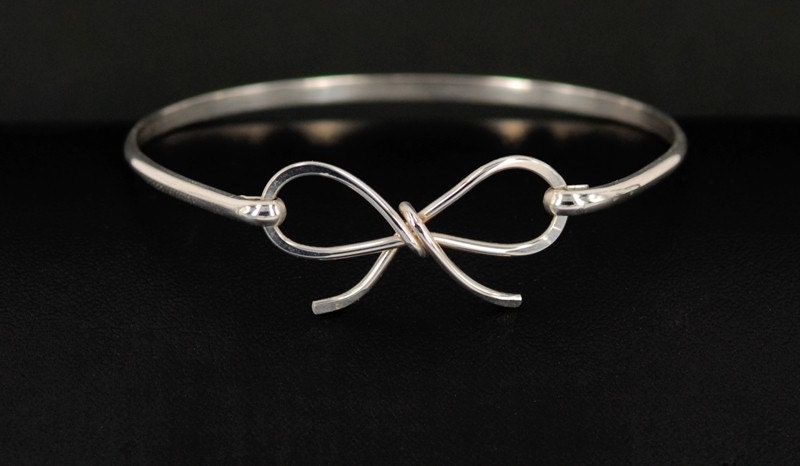 Forget me knot bow sterling silver bangle