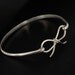Forget me knot bow sterling silver bangle