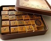 Wooden stamps in a can - Alphabets