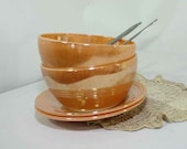 Vintage Fire-king peach luster ware Bowls and saucers.
