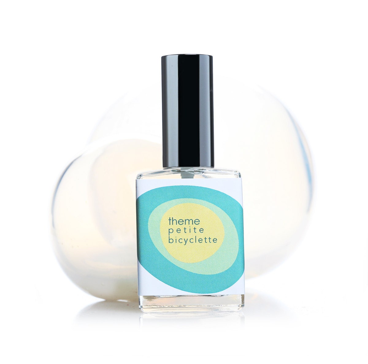 Petite Bicyclette perfume. Yuzu grapefruit citrus fresh perfume.  An aromatic ode to a vignette of a girl in a fresh yellow mint dress