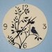 Perched Bird wall clock