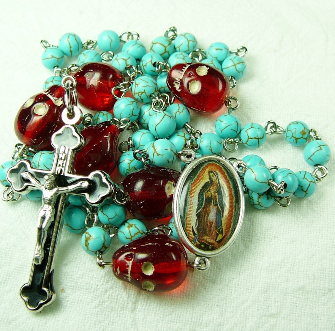 Muertos Skull Rosary with Red Skulls and Blue Stone