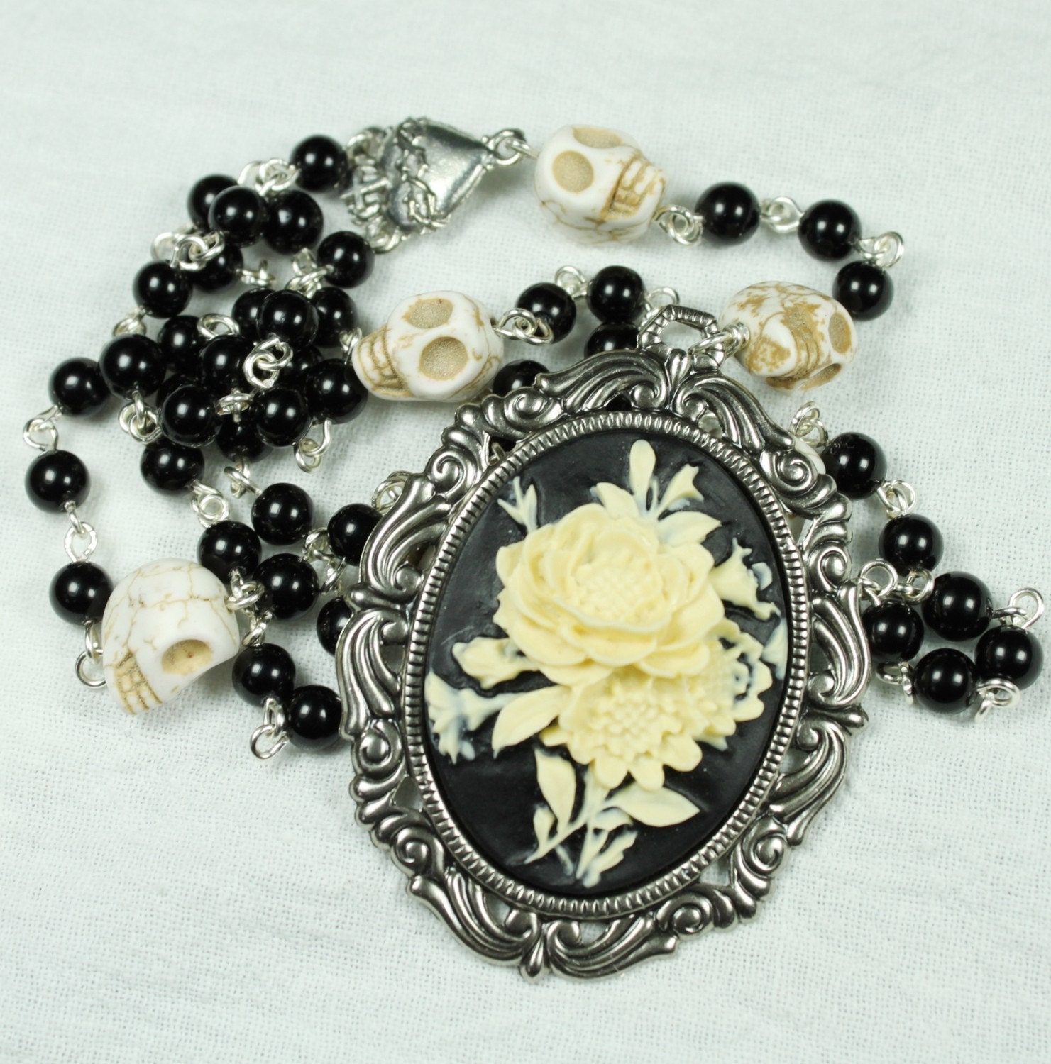 Muertos Skull Rosary with White Rose Cameo and White Stone Skulls