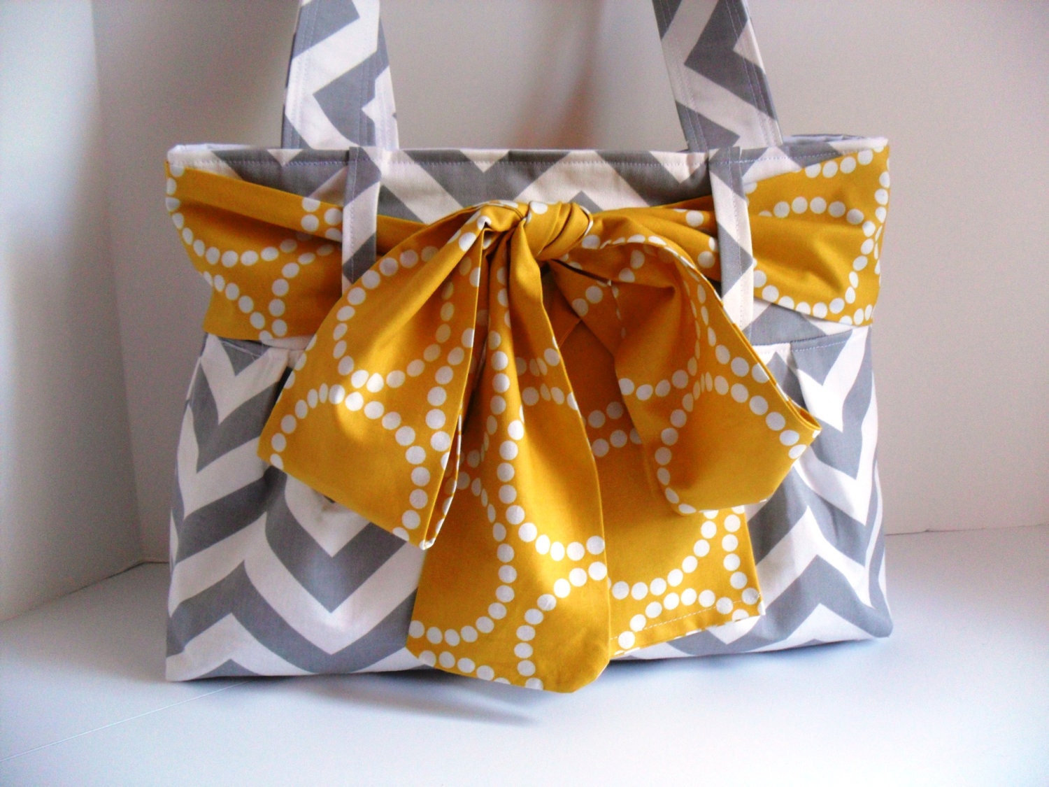 Small Handbag Made of Chevron  Fabric and Yellow Bow