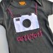 Camera handstitched onesie