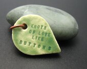 knots of love like buttons -- ceramic pendant