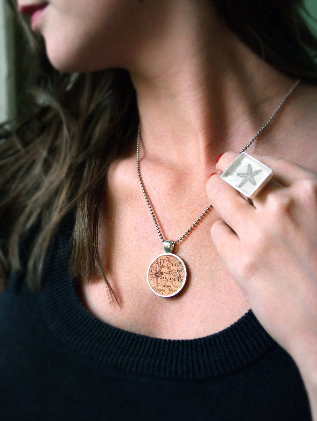 custom vintage map set in a sterling silver plated bezel under resin