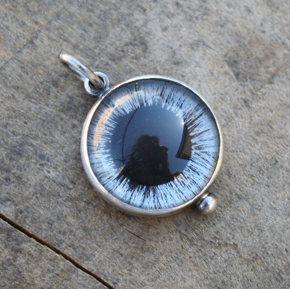 innocent eyeball charm