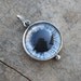 innocent eyeball charm