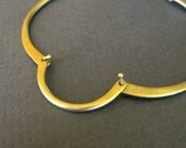 Quatrefoil Silhouette - brass articulated link bracelet