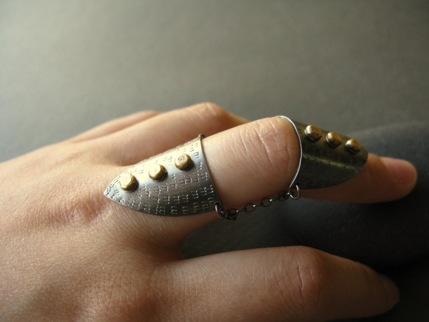 Articulated Finger Armor - oxidized silver ring with brass studs and hand-stamped patterns
