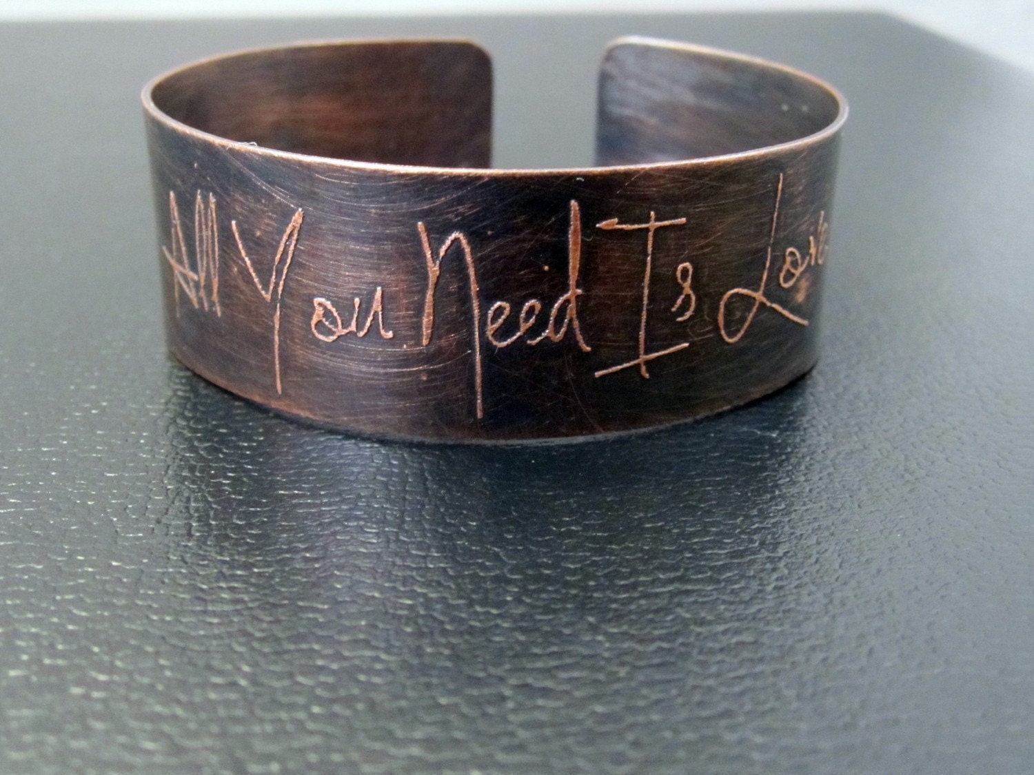 All You Need is Love copper etched cuff bracelet